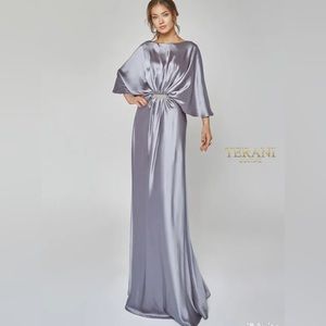 NWT Elegant Gown in silver with a slight tint of purple by Terani Couture